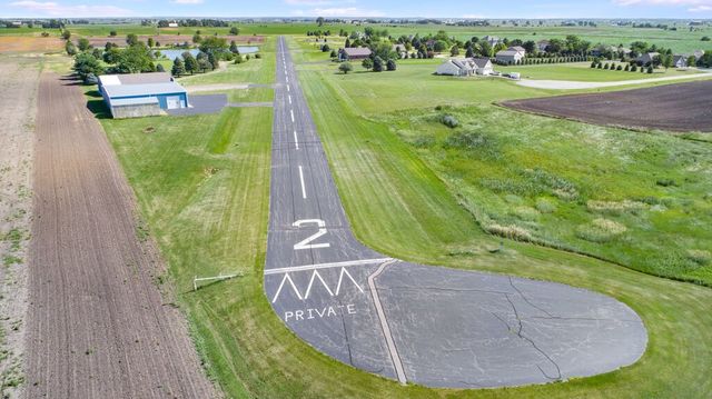 Lot 19 Eagle Drive Genoa, IL 60135 - Photo 7 of 7 a view of a swimming pool with a garden