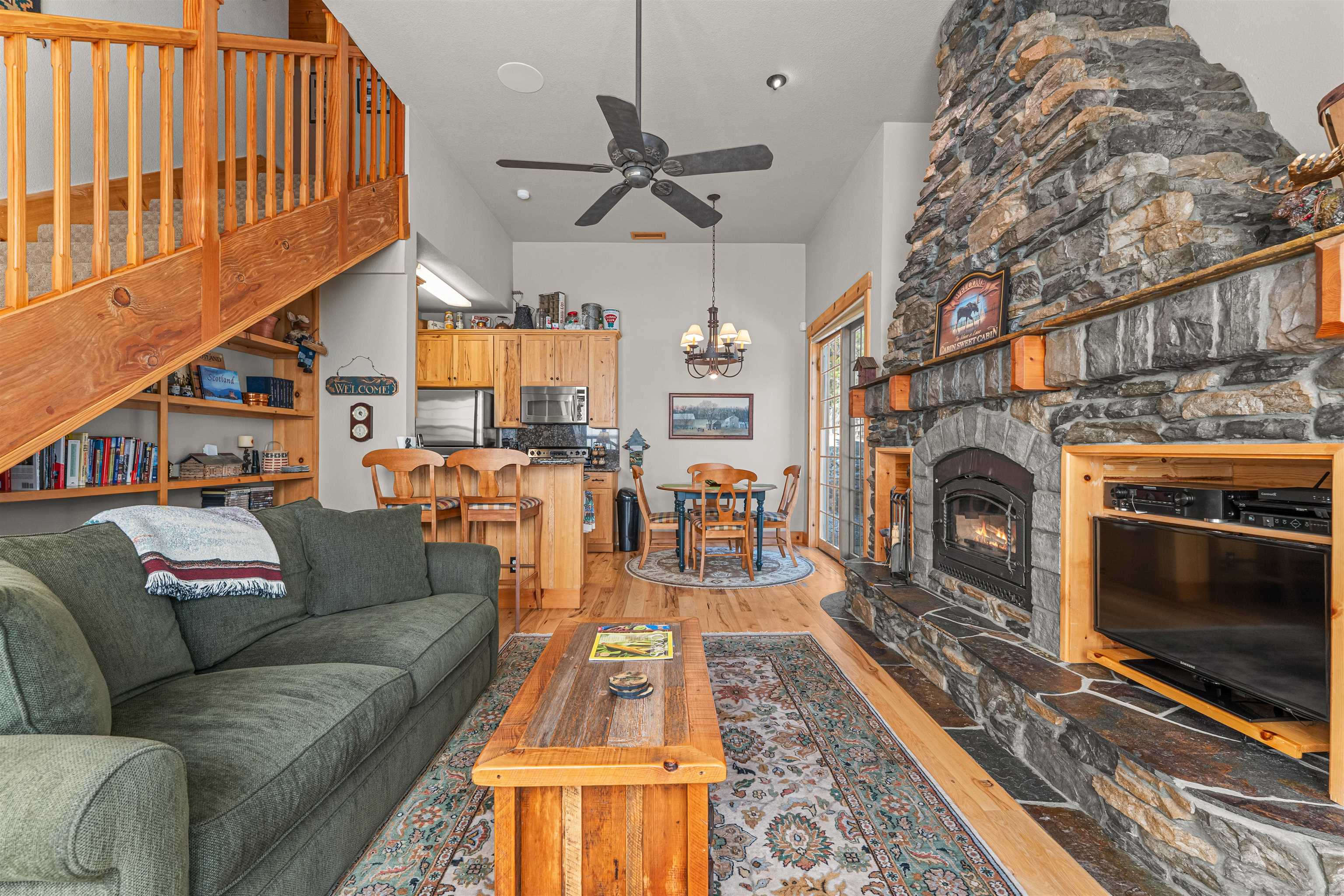 440 Valley Ranch Drive Clio, CA 96106 - Photo 24 of 50 a living room with furniture a fireplace and a rug