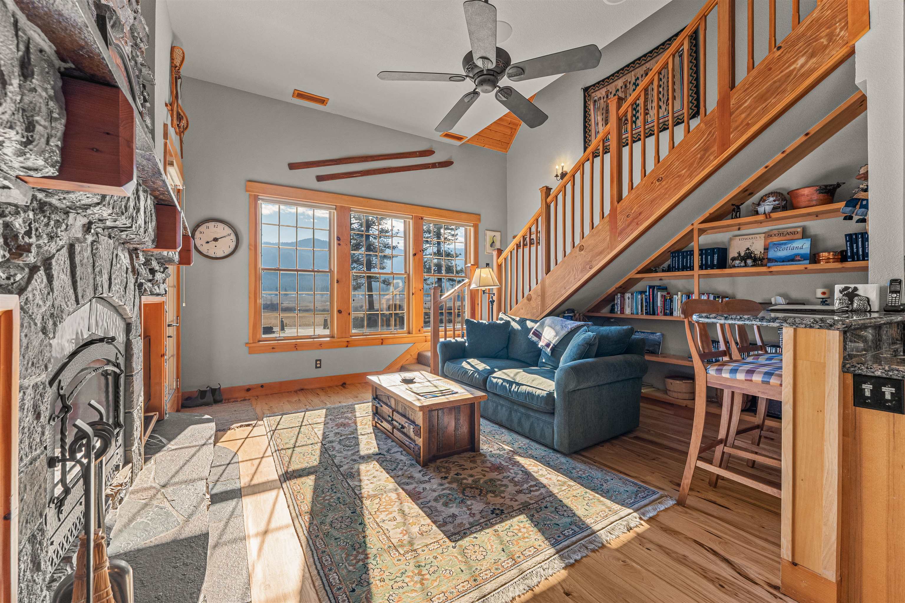 440 Valley Ranch Drive Clio, CA 96106 - Photo 26 of 50 a living room with fireplace furniture and a rug