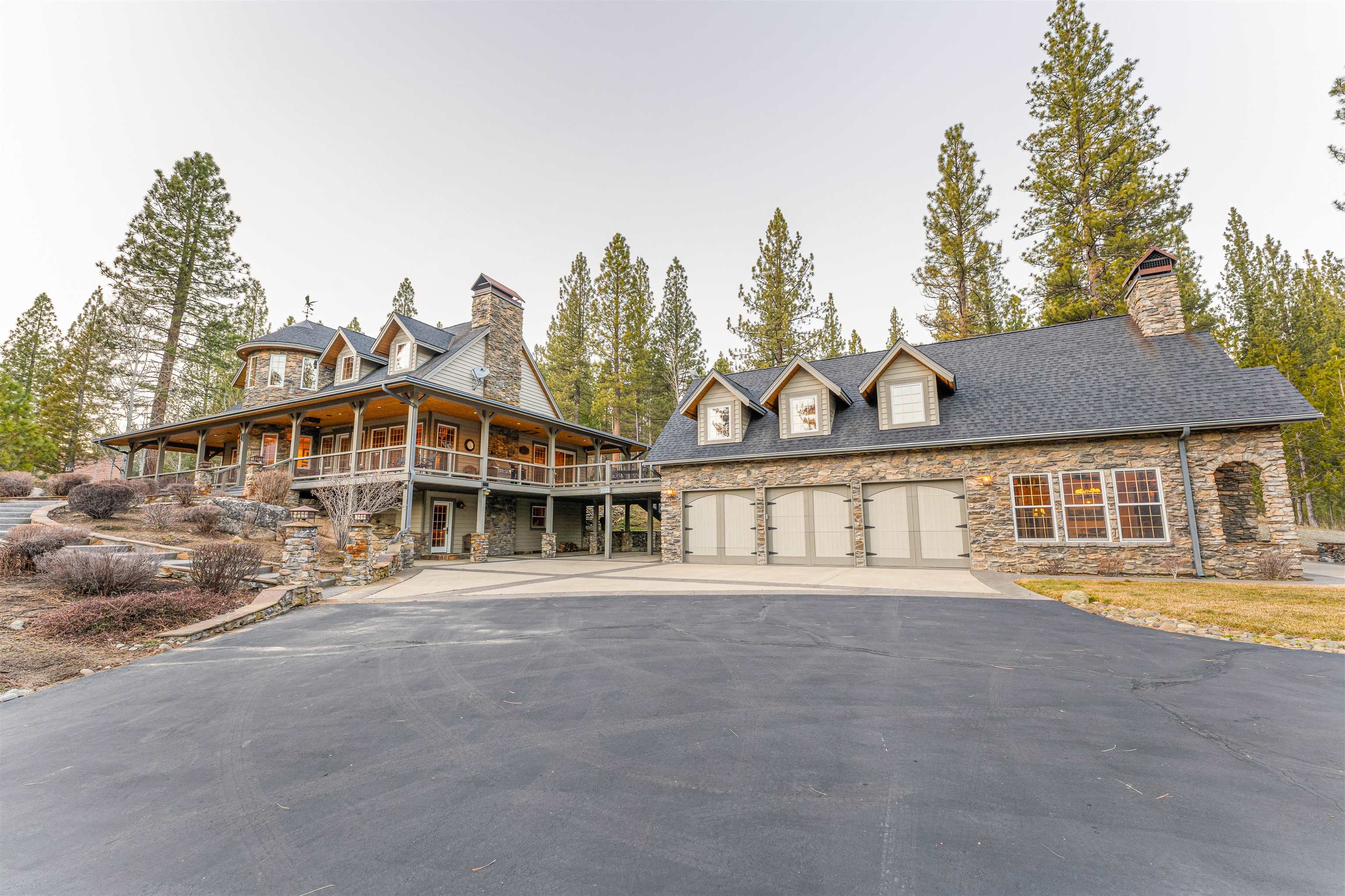 440 Valley Ranch Drive Clio, CA 96106 - Photo 46 of 50 a front view of a house with a yard and lake view