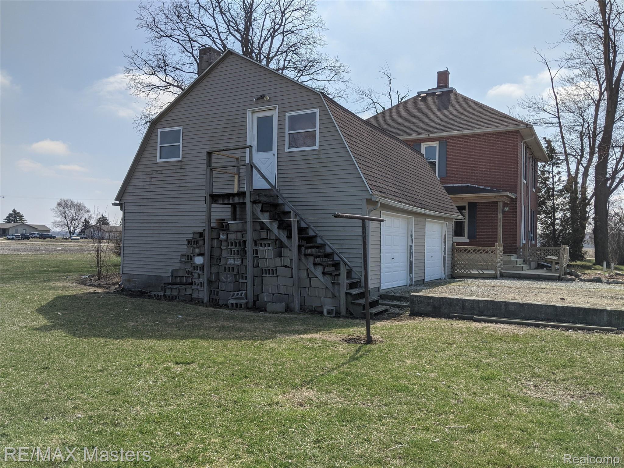 5644 Zink Road Maybee, MI 48159 - Photo 29 of 38 Back Of Home And Garage