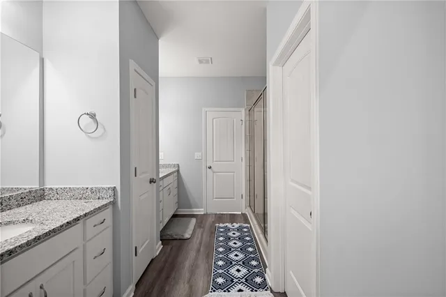 a bathroom with sink and mirror