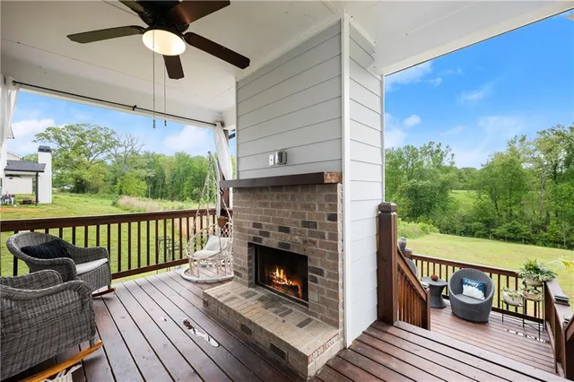 a view of a roof deck with couches