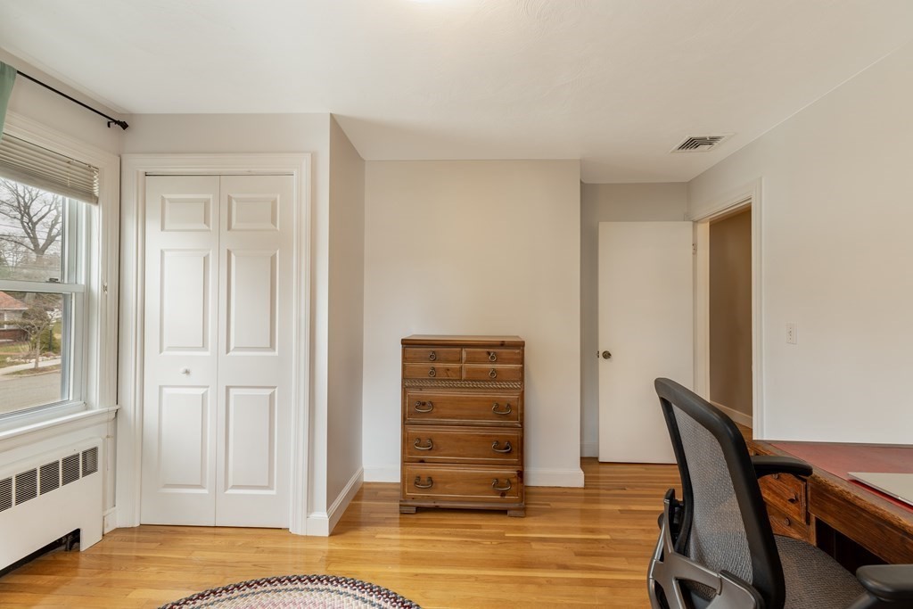 107 Oliver Road Waban, MA 02468 - Photo 18 of 32 a view of room with wooden floor and bathroom