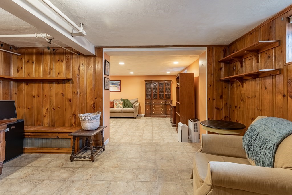 107 Oliver Road Waban, MA 02468 - Photo 24 of 32 a living room with furniture