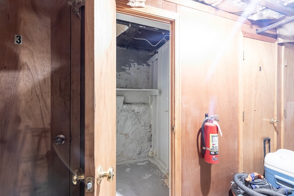 185 Lewis Street, Unit 4 Lynn, MA 01902 - Photo 17 of 20 a bathroom with a shower and a toilet