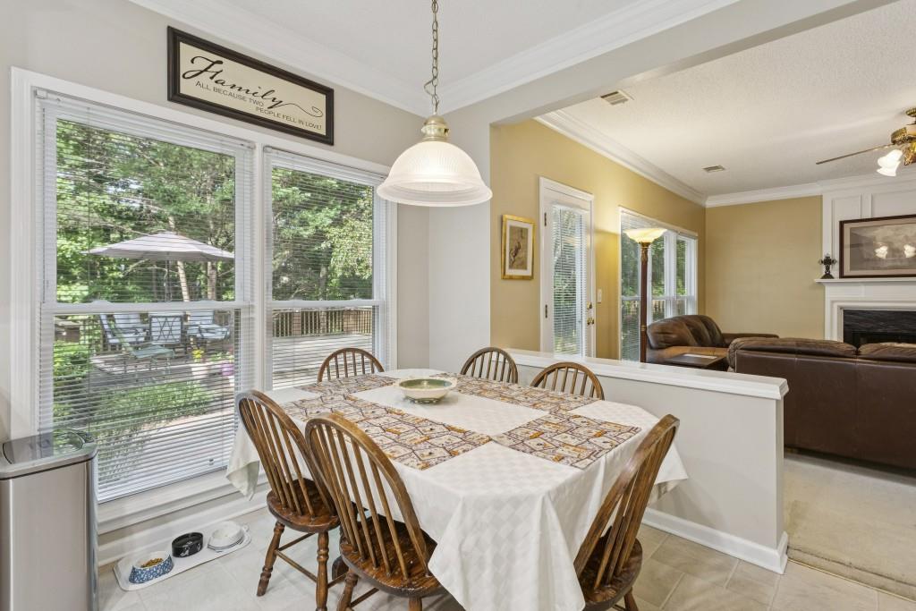 4815 Tanners Spring Drive Alpharetta, GA 30022 - Photo 14 of 45 a dining room with furniture and window