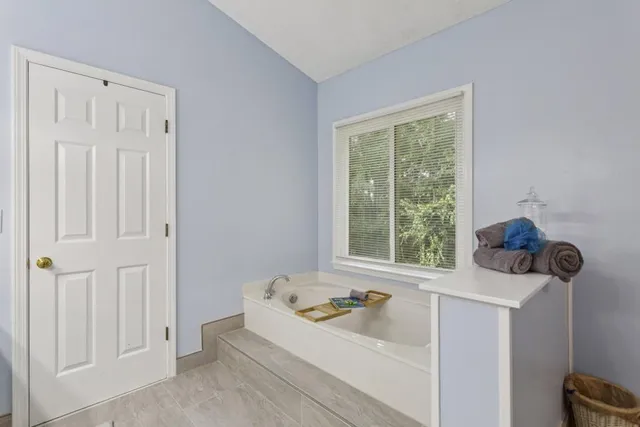 a bathroom with a sink and bathtub
