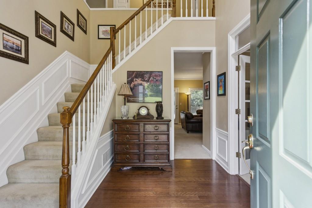 4815 Tanners Spring Drive Alpharetta, GA 30022 - Photo 3 of 45 a view of entryway and hall with wooden floor