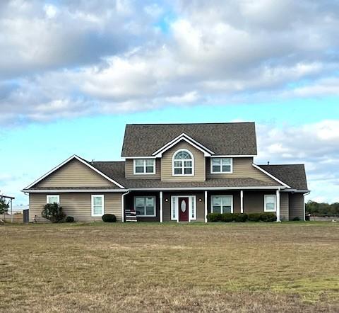 a front of a house with a yard