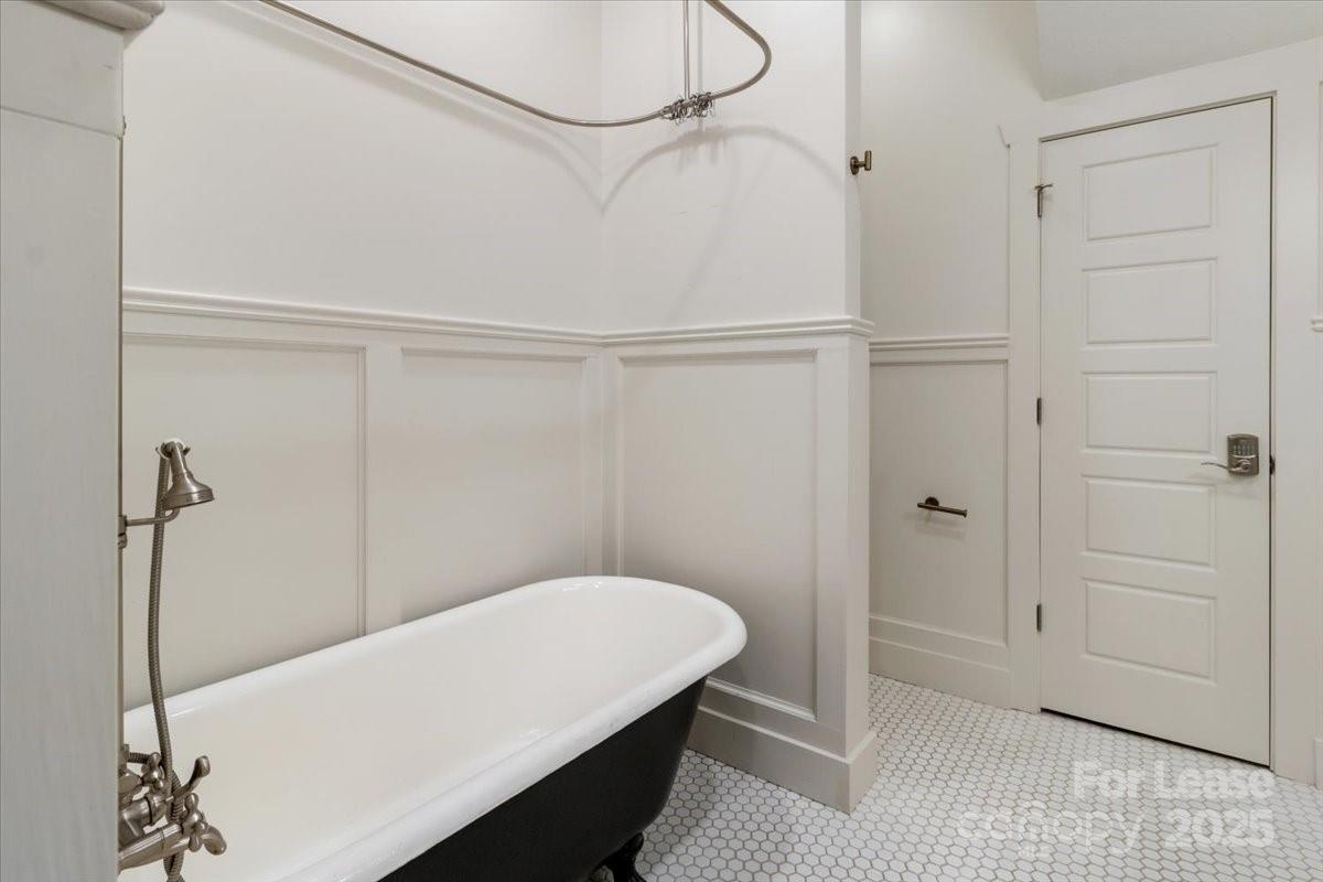 756 Bailey Street Mars Hill, NC 28754 - Photo 12 of 23 a bathroom with a sink and a shower