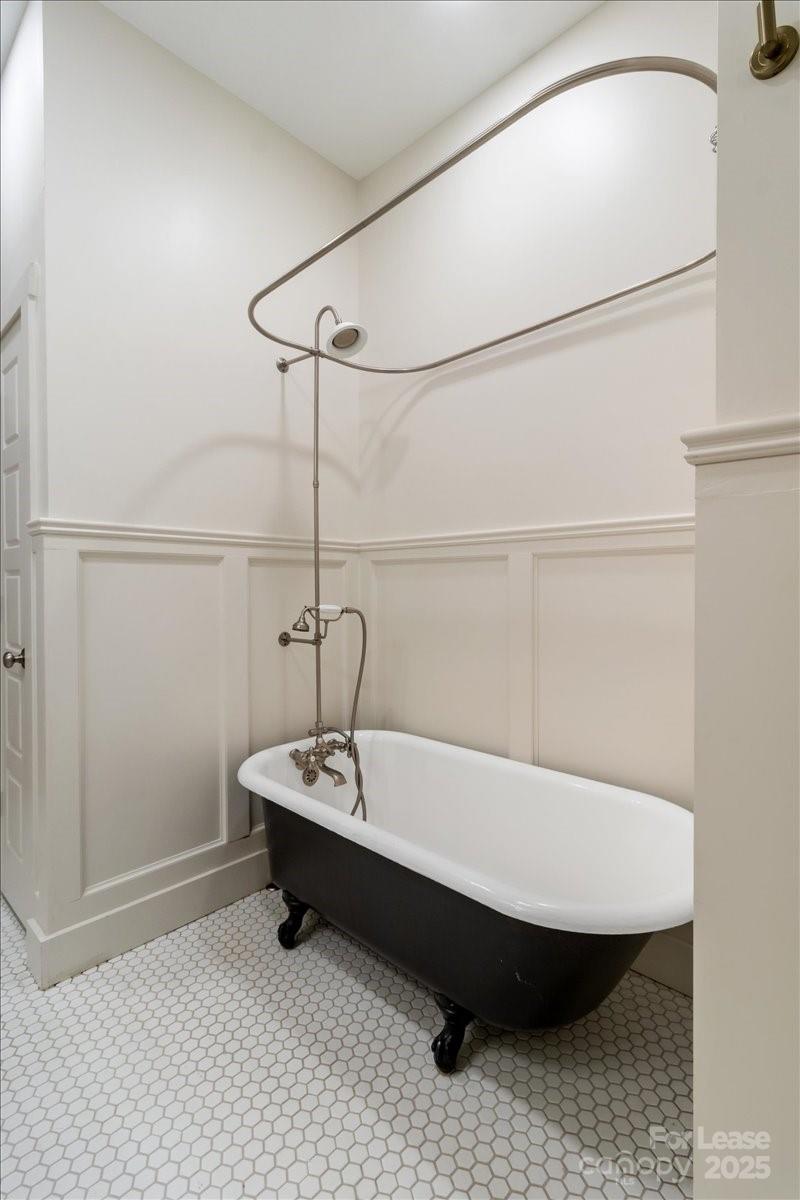 756 Bailey Street Mars Hill, NC 28754 - Photo 13 of 23 a bathroom with a sink and a bath tub