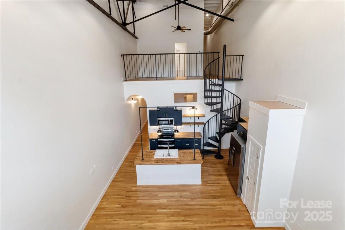756 Bailey Street Mars Hill, NC 28754 - Photo 5 of 23 a view of entryway and hall with wooden floor