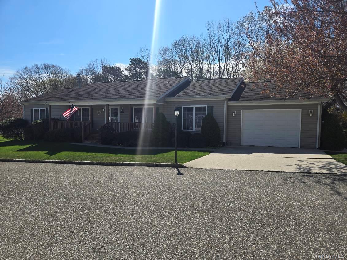 1407 Middle Road, Unit 265 Calverton, NY 11933 - Photo 1 of 13
