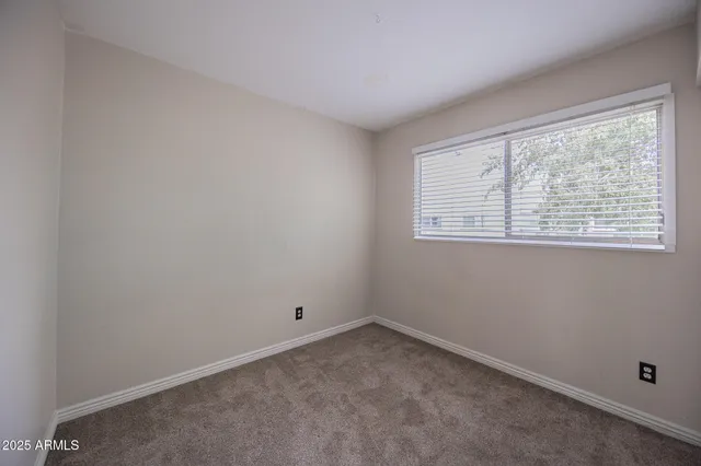 a view of an empty room with window