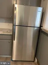 a close view of a refrigerator in kitchen