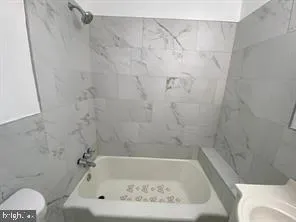 a bathroom with a bathtub
