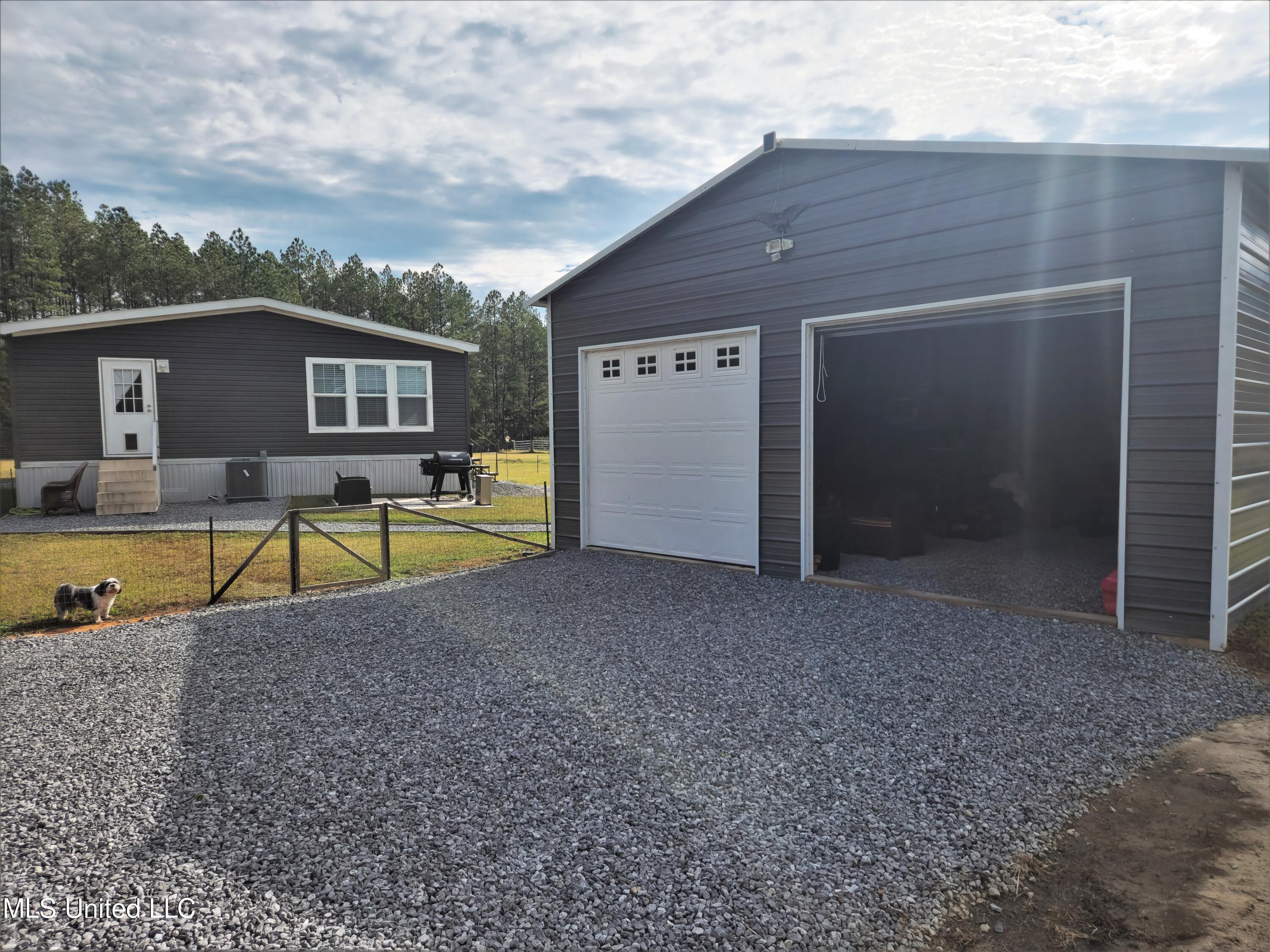 15785 Omas Road Vancleave, MS 39565 - Photo 4 of 20 garage front