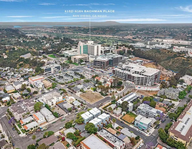an aerial view of residential building with parking space