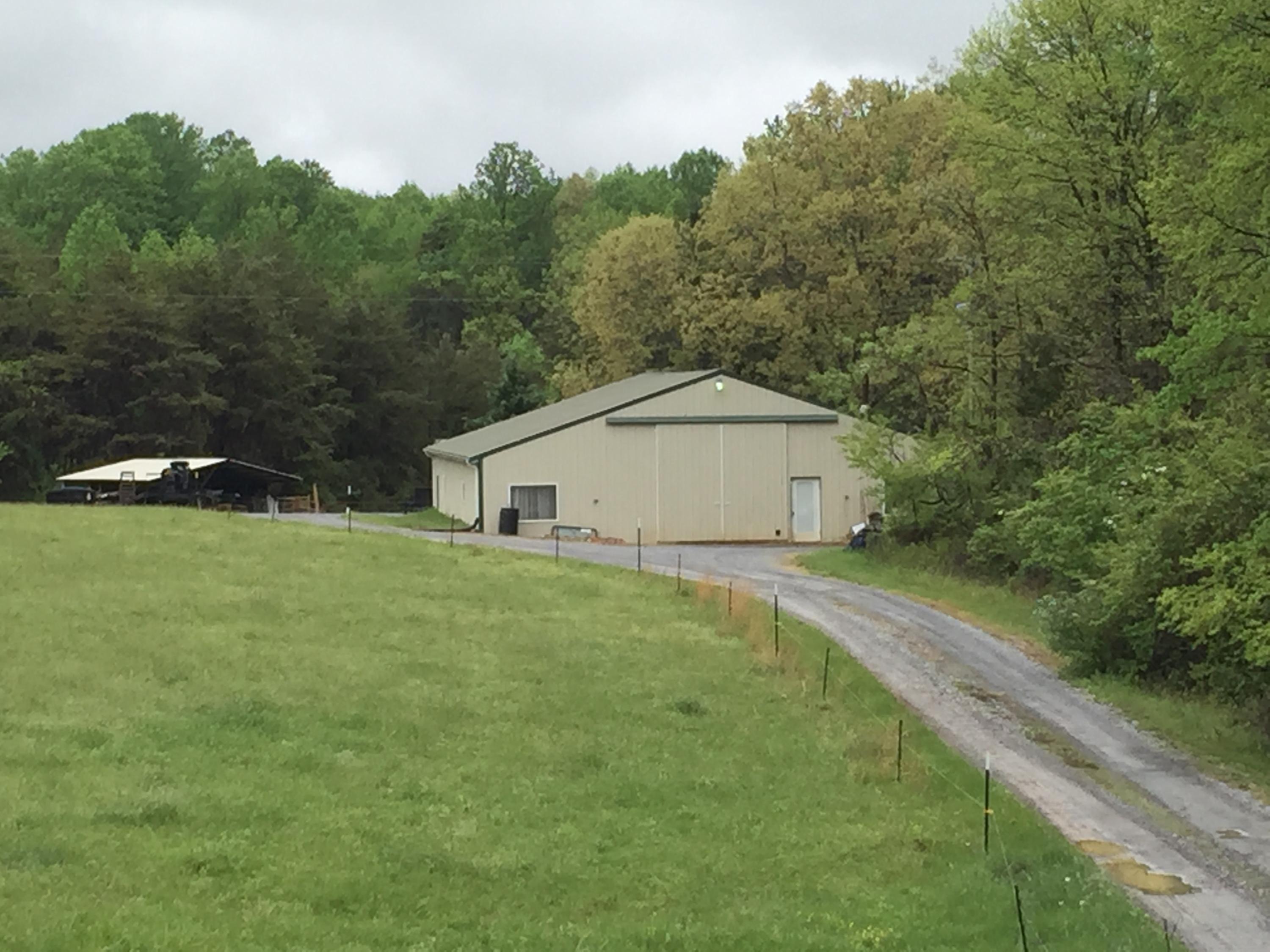 4560 White House Road Moneta, VA 24121 - Photo 7 of 17 a house view with a outdoor space