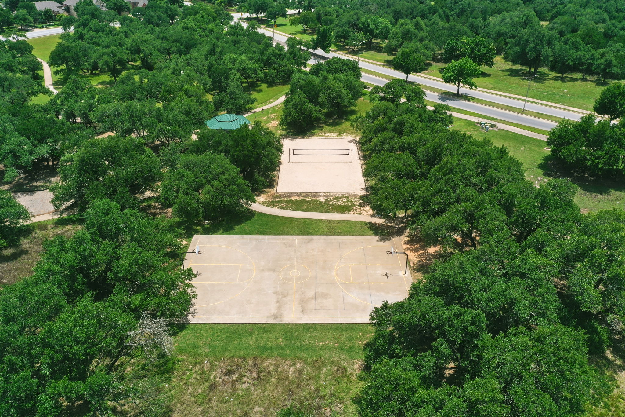 110 Dasher Drive Cedar Park, TX 78613 - Photo 30 of 39 Sporting enthusiasts will love the on-site basketball and volleyball courts surrounded by a verdant canopy.