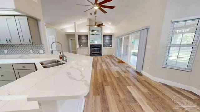 a bathroom with a bathtub and a toilet