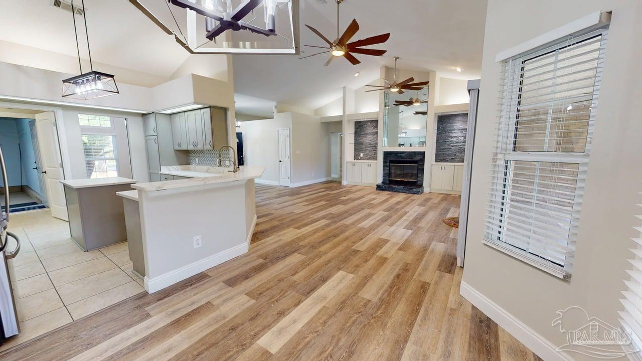 10111 Bristol Park Road Cantonment, FL 32533 - Photo 24 of 72 a view of a kitchen with furniture and a kitchen