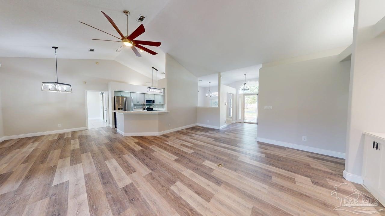 10111 Bristol Park Road Cantonment, FL 32533 - Photo 31 of 72 a view of a kitchen with a sink and a kitchen view