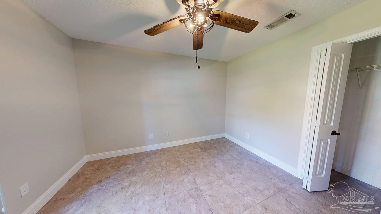 10111 Bristol Park Road Cantonment, FL 32533 - Photo 39 of 72 wooden floor in an empty room