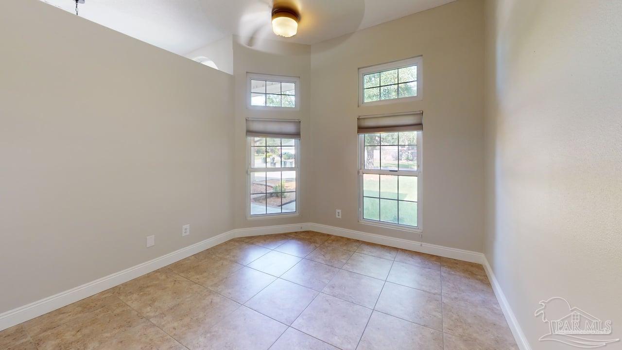10111 Bristol Park Road Cantonment, FL 32533 - Photo 53 of 72 a view of an empty room with a window