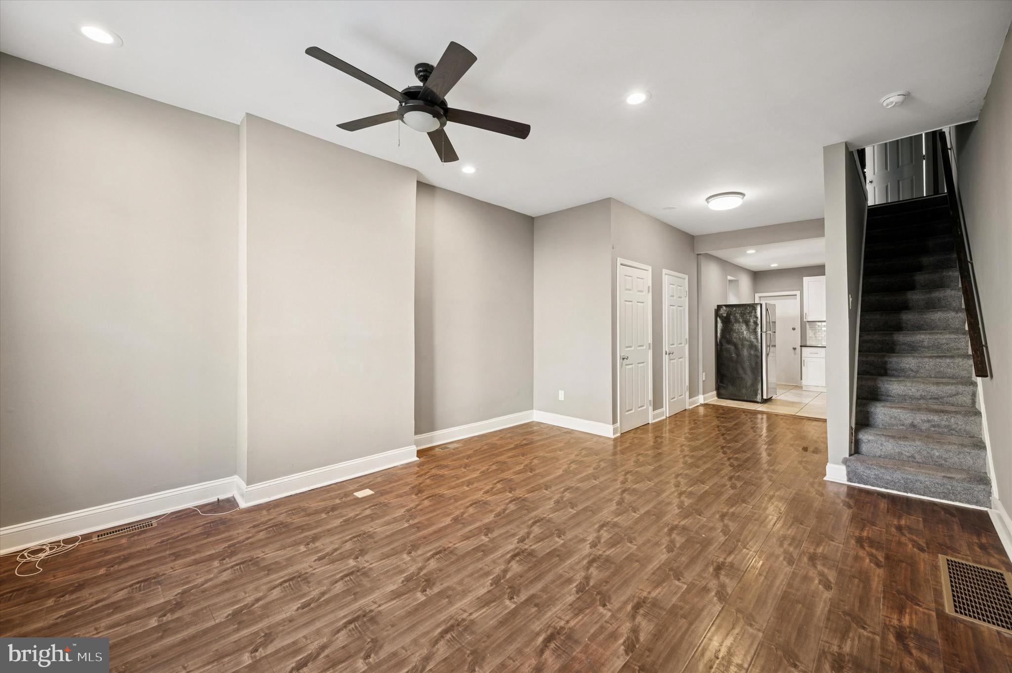 2147 North Marston Street Philadelphia, PA 19121 - Photo 2 of 15 a view of empty room with wooden floor and ceiling fan