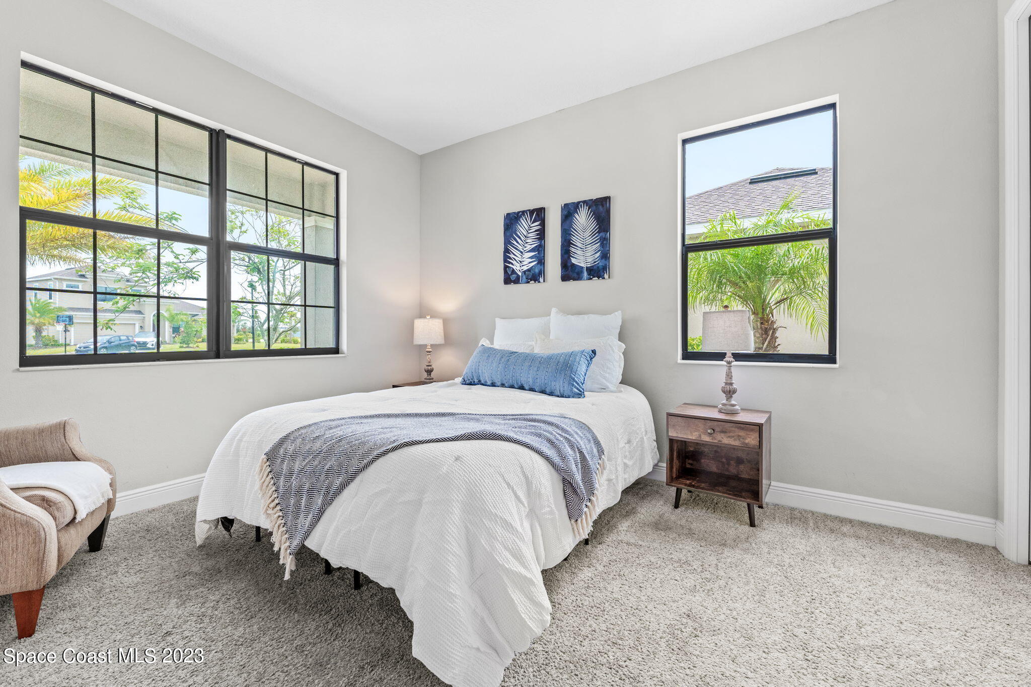 3640 Stabane Place Melbourne, FL 32940 - Photo 12 of 85 a bedroom with a bed and a couch