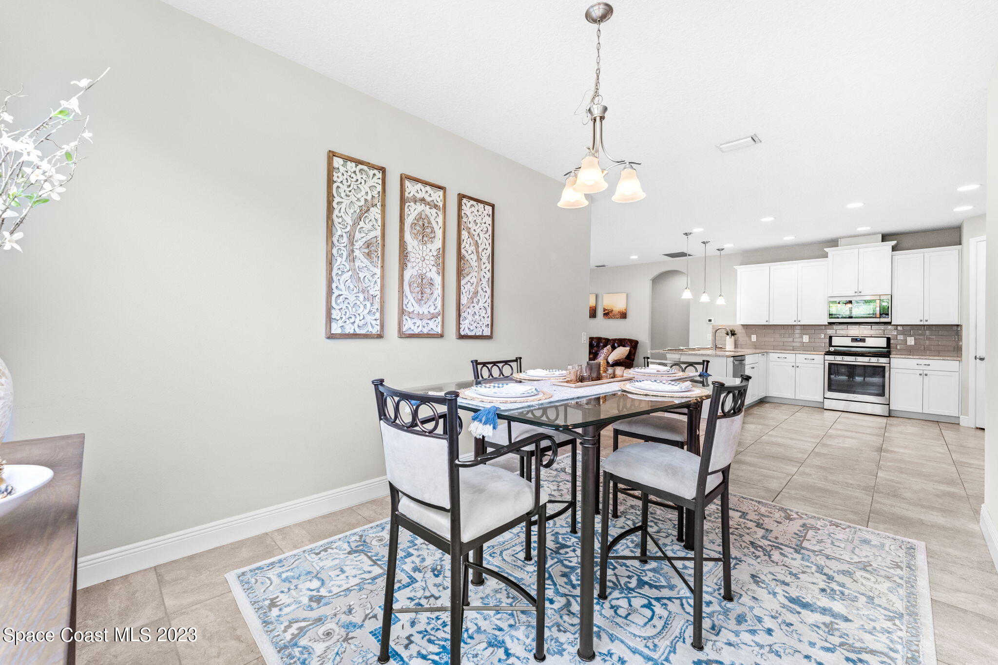 3640 Stabane Place Melbourne, FL 32940 - Photo 27 of 85 a view of a dining room and livingroom view