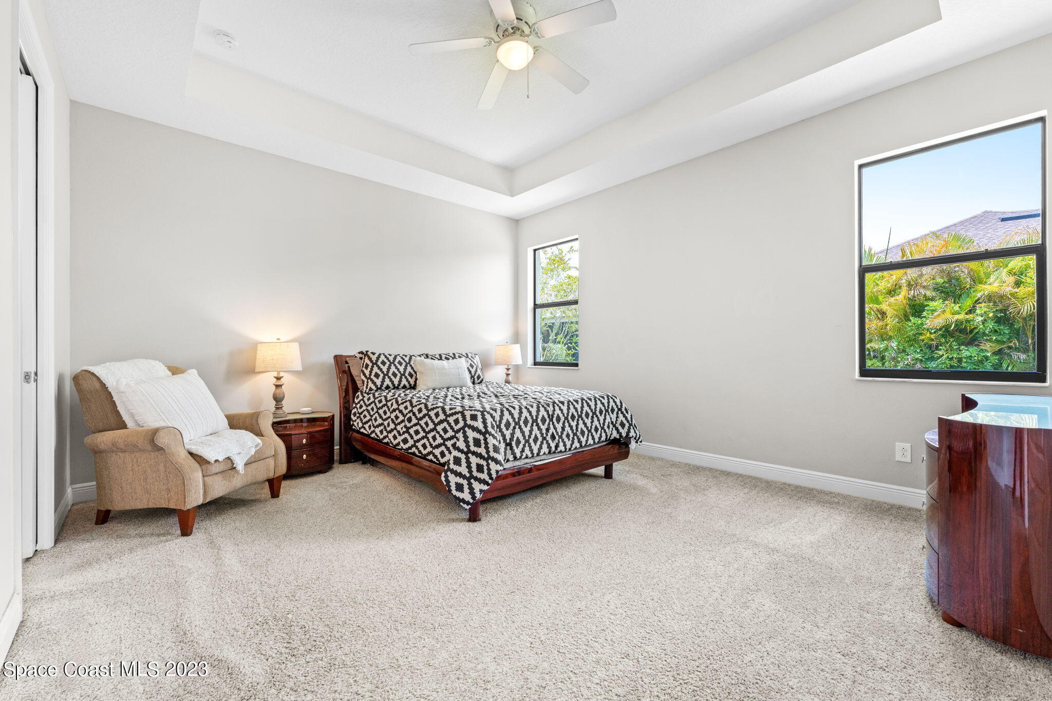 3640 Stabane Place Melbourne, FL 32940 - Photo 42 of 85 a bedroom with a bed rug and window