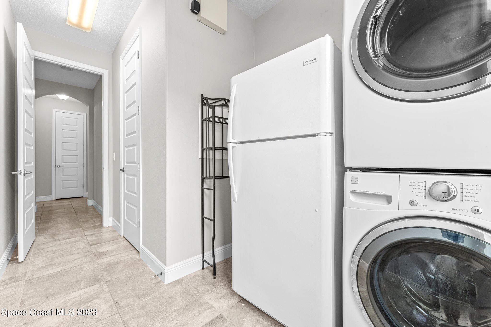 3640 Stabane Place Melbourne, FL 32940 - Photo 47 of 85 a view of a storage and utility room with washer and dryer