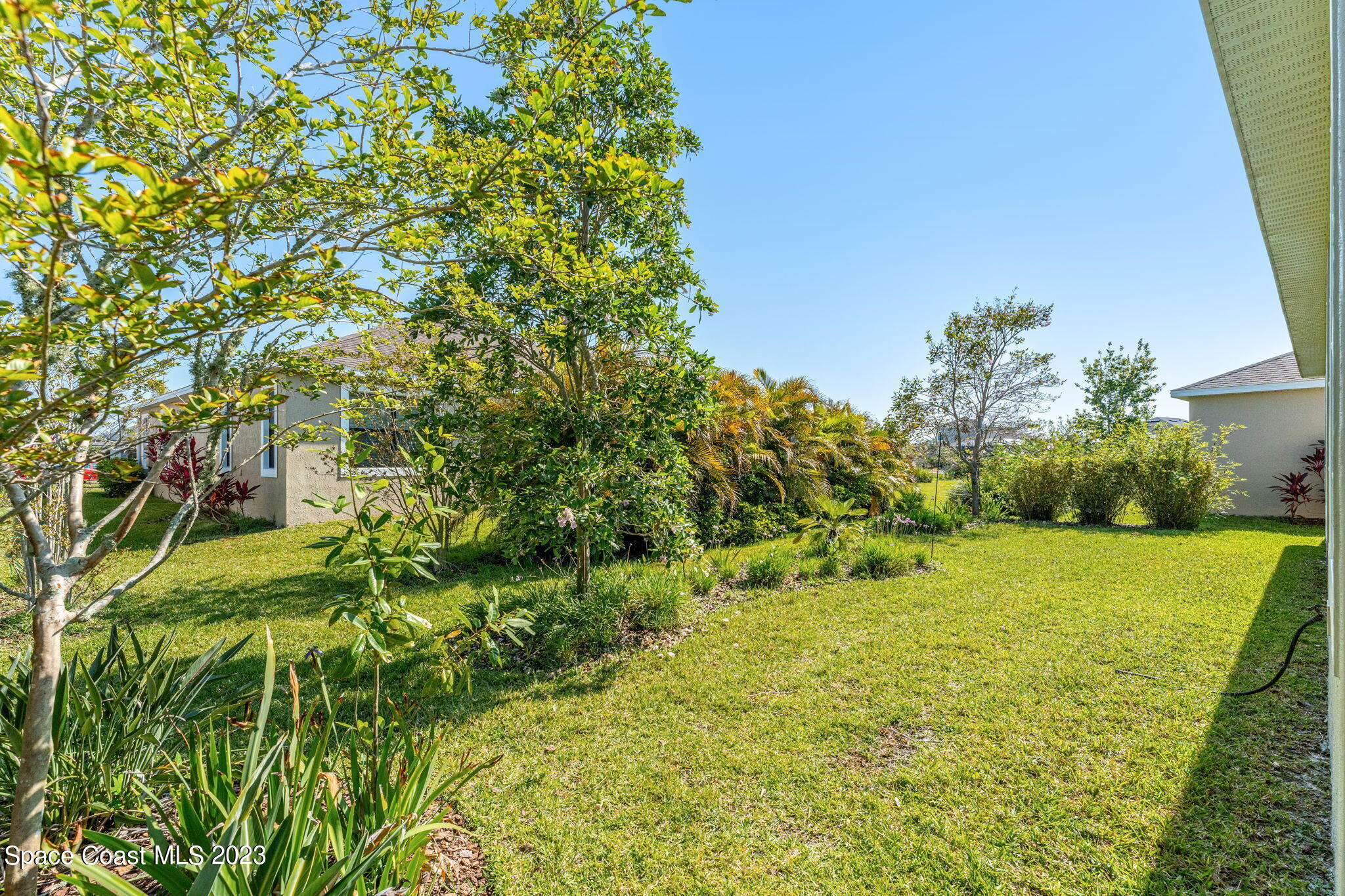 3640 Stabane Place Melbourne, FL 32940 - Photo 57 of 85 a view of an outdoor space and a yard