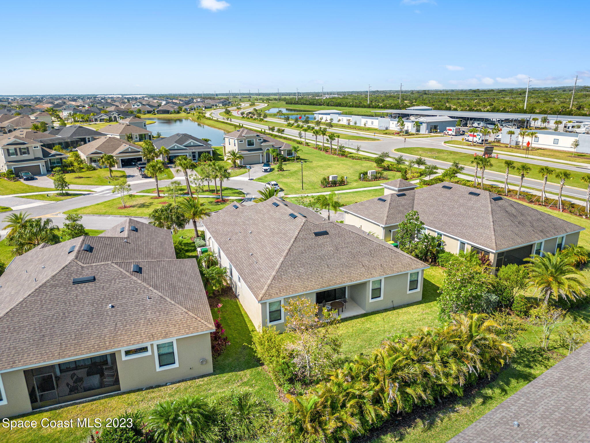 3640 Stabane Place Melbourne, FL 32940 - Photo 66 of 85 an aerial view of residential houses with outdoor space and ocean view