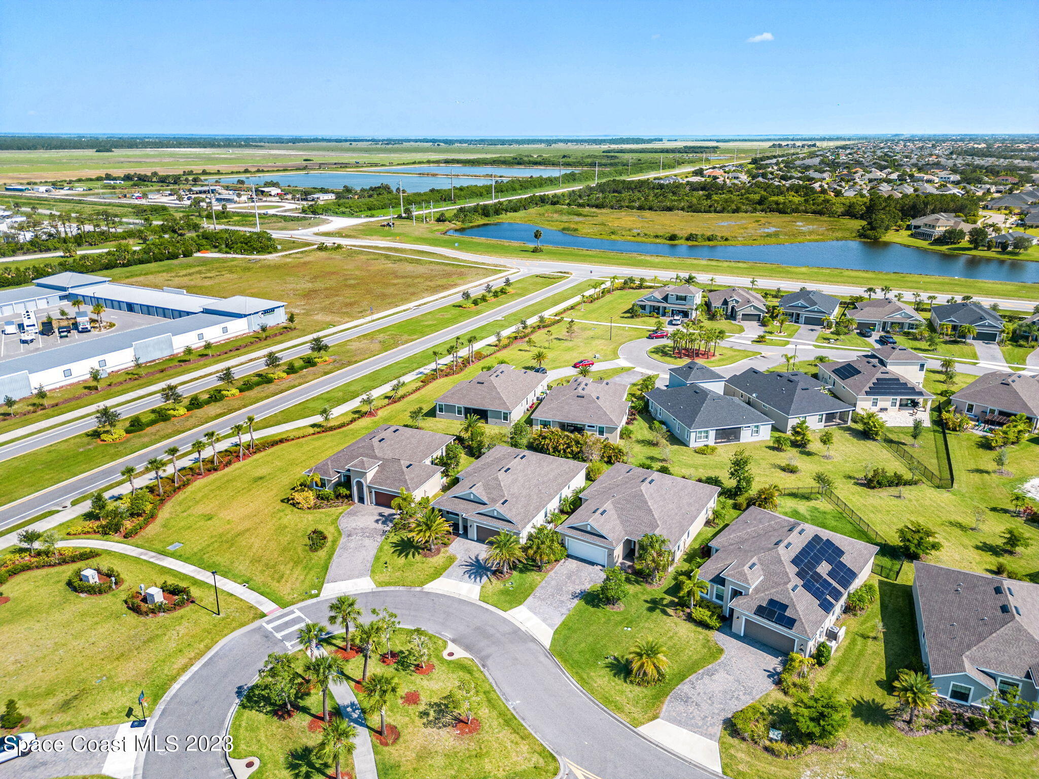 3640 Stabane Place Melbourne, FL 32940 - Photo 68 of 85 an aerial view of residential houses with outdoor space and ocean view