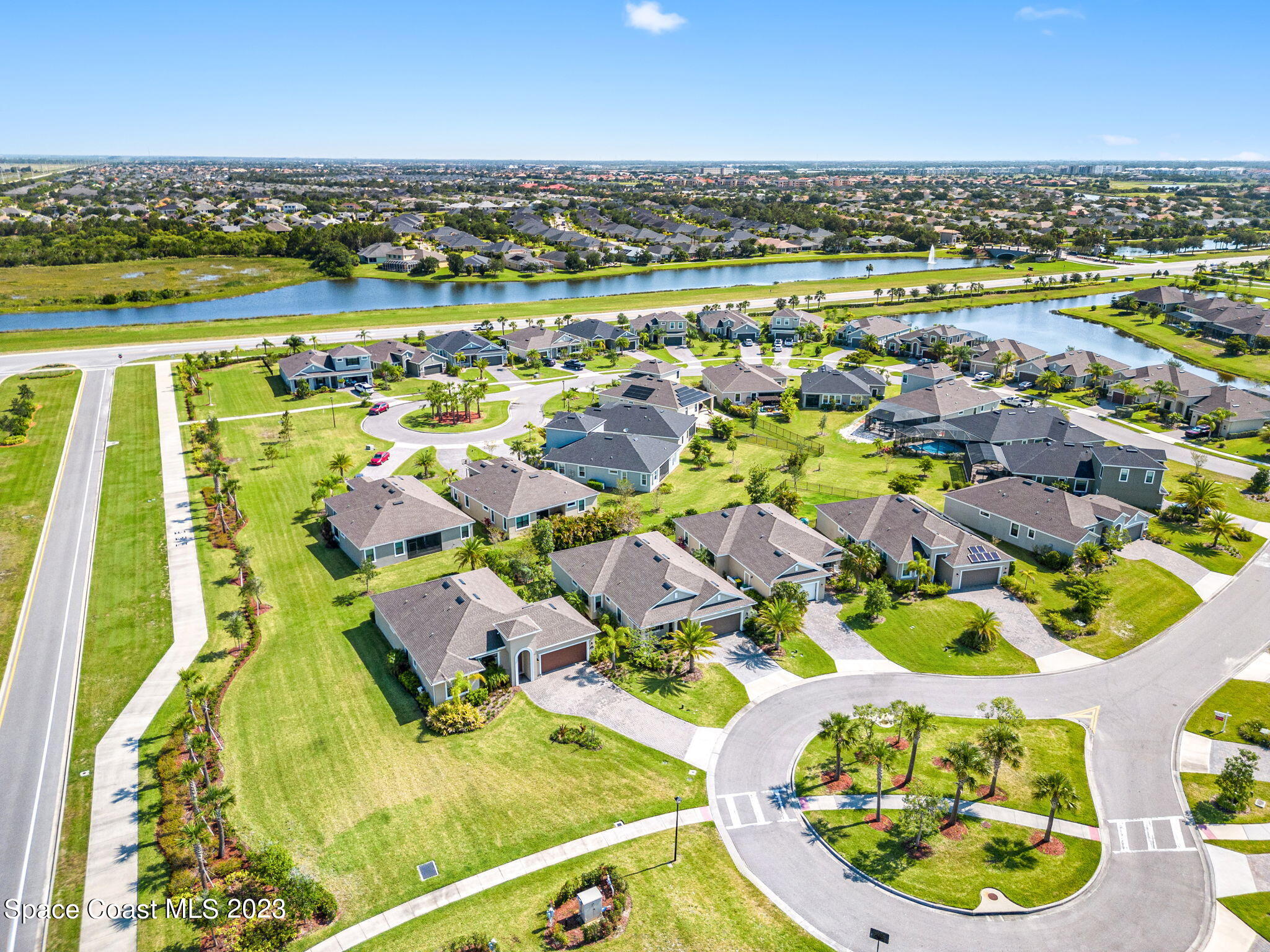 3640 Stabane Place Melbourne, FL 32940 - Photo 70 of 85 an aerial view of residential houses with outdoor space