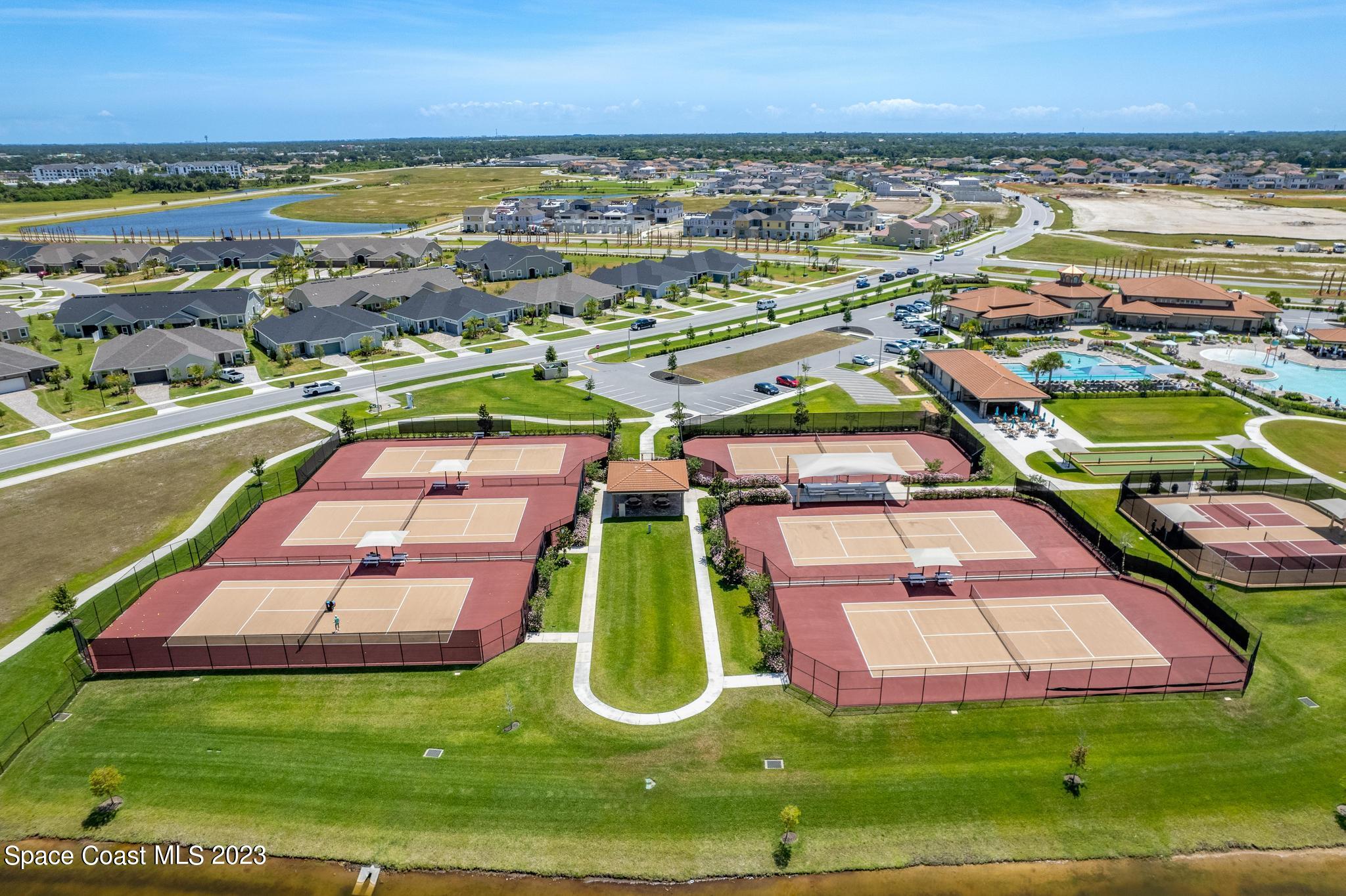 3640 Stabane Place Melbourne, FL 32940 - Photo 78 of 85 an aerial view of residential houses with outdoor space and swimming pool