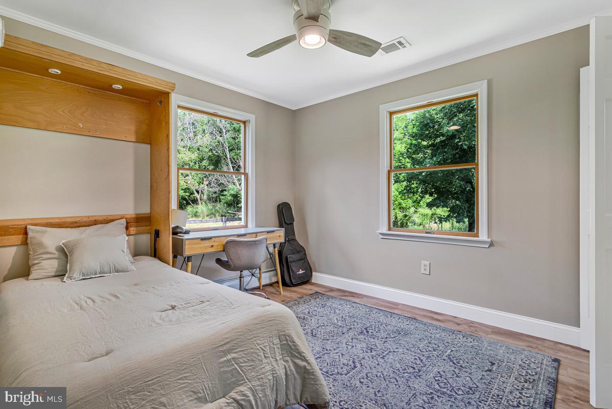 1410 Dent Road Shady Side, MD 20764 - Photo 27 of 42 Bright and airy retreat with nature views.