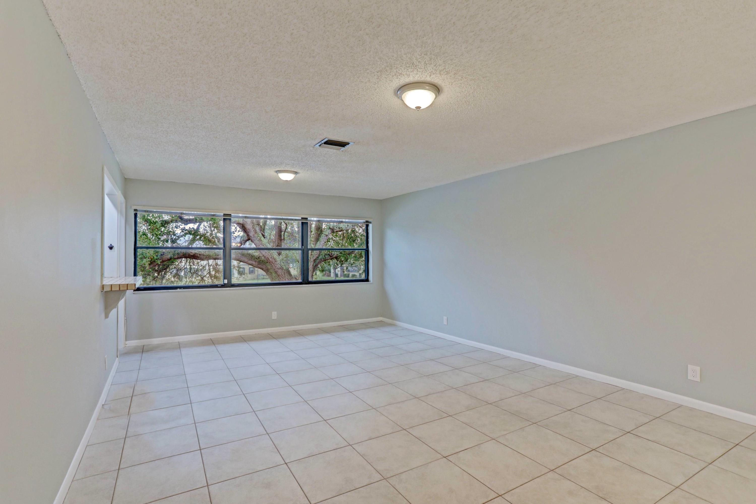 3011 Southwest 21st Terrace, Unit 382A Delray Beach, FL 33445 - Photo 11 of 42 11_living room 1