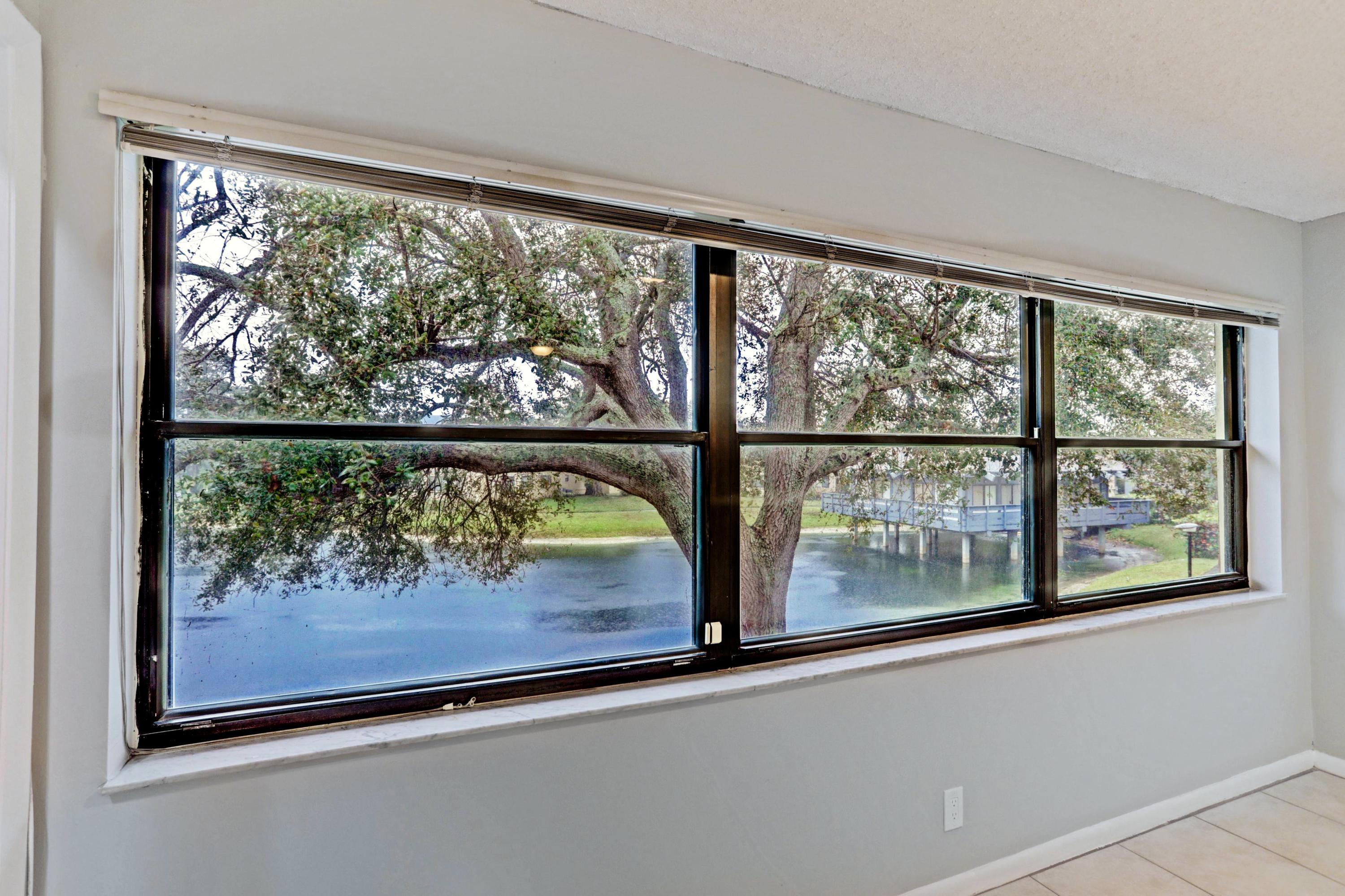 3011 Southwest 21st Terrace, Unit 382A Delray Beach, FL 33445 - Photo 19 of 42 19_living room lakeview