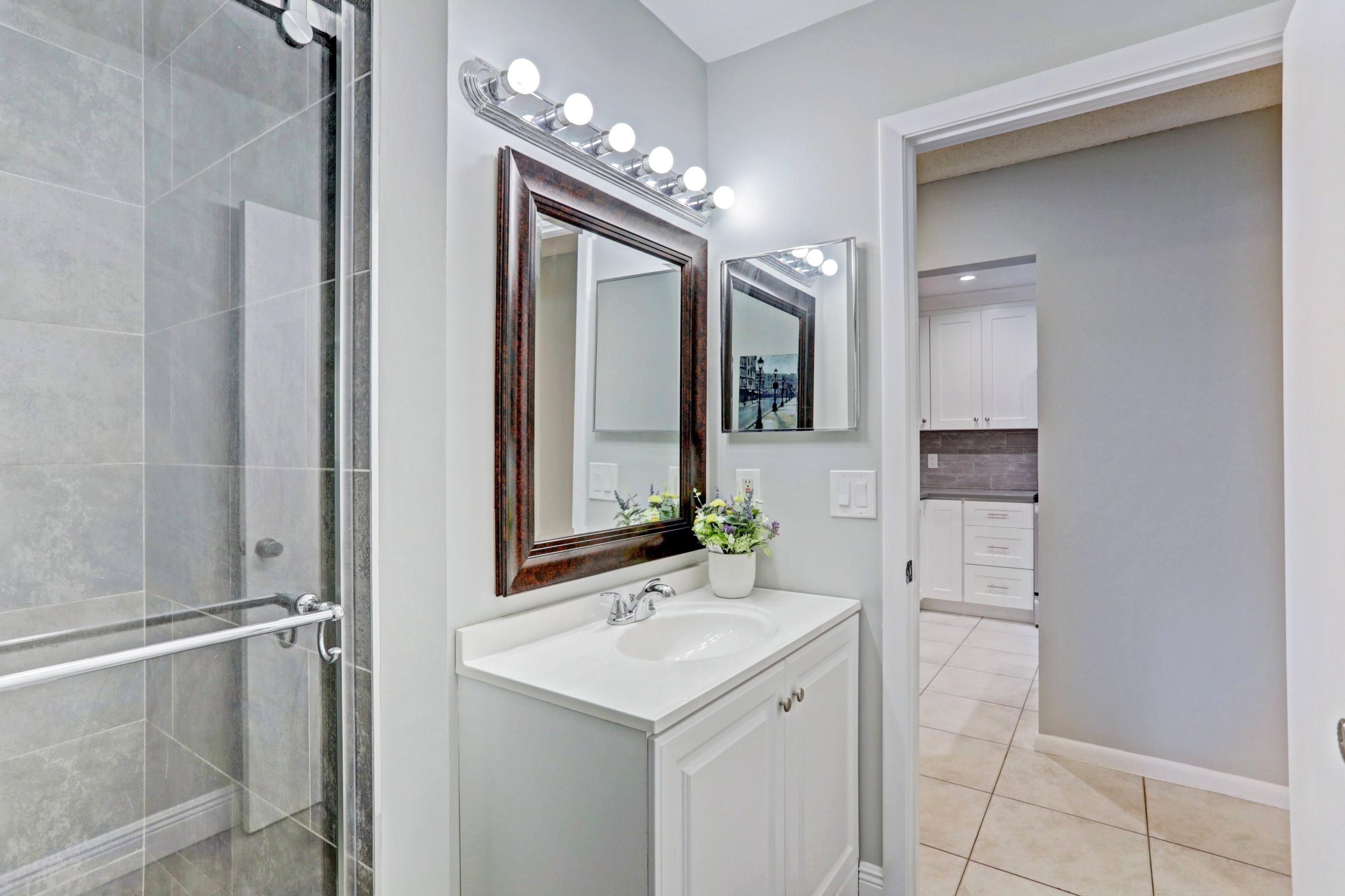 3011 Southwest 21st Terrace, Unit 382A Delray Beach, FL 33445 - Photo 29 of 42 29_guest bathroom 1