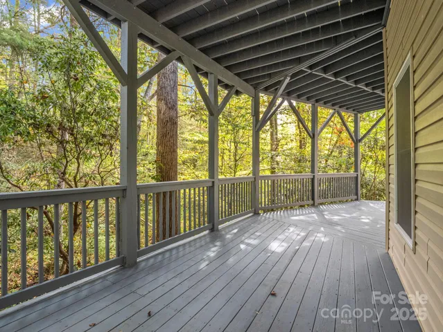 a view of porch with wooden floor in outdoor space