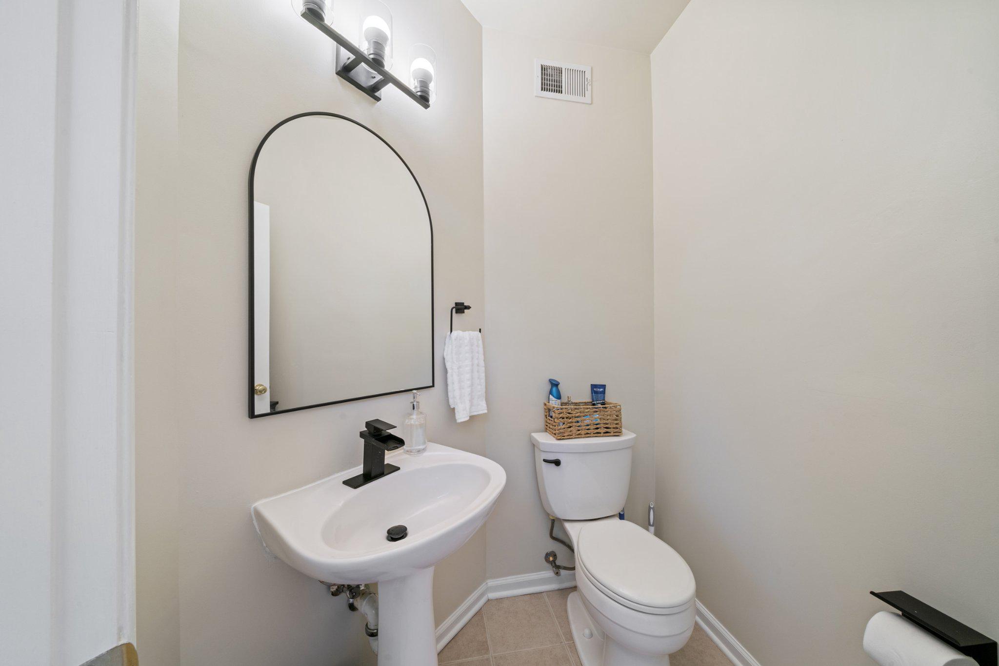 13916 Lullaby Road Germantown, MD 20874 - Photo 15 of 45 Main level half bath.