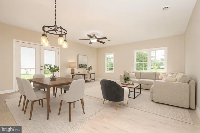 a view of a livingroom with furniture and window