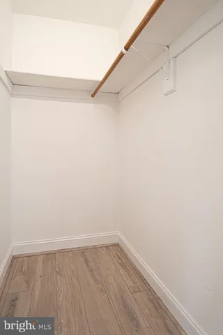a view of an empty walk in closet