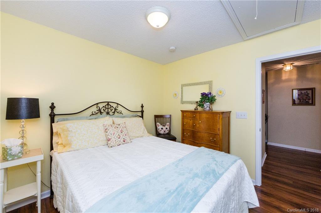 236 Grayland Road Mooresville, NC 28115 - Photo 20 of 27 a bedroom with a bed and a flat screen tv