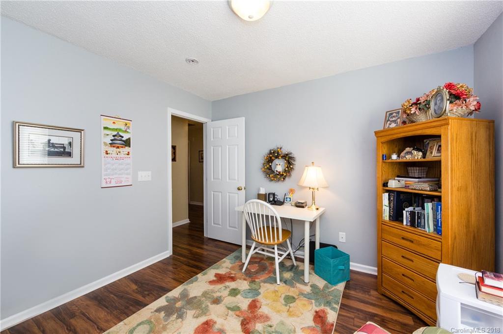 236 Grayland Road Mooresville, NC 28115 - Photo 23 of 27 a workspace room with furniture and wooden floor